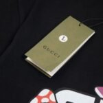 Gucci Graphic T-shirt with Cartoon Black Logo - Image 7