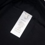Gucci Graphic T-shirt with Cartoon Black Logo - Image 8